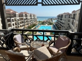 Spacious 2 bedroom apartment with a stunning sea view in the compound with a private beach