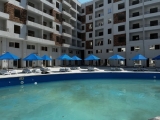 Spacious 1 bedroom apartment with a pool view in Tiba Golden compound